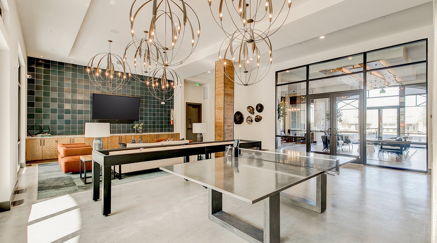 Game Room Large well lit game room with ping pong and access to the pool